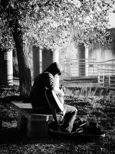 Minstrel at the Lake: Photo by Noelle